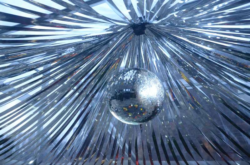 Mirror Ball hanging under a tent for a bar-mitzvah at The Foundry.