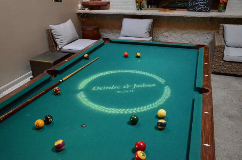 A custom gobo projected on a pool table in The Pool Room for a wedding at The Foundry.