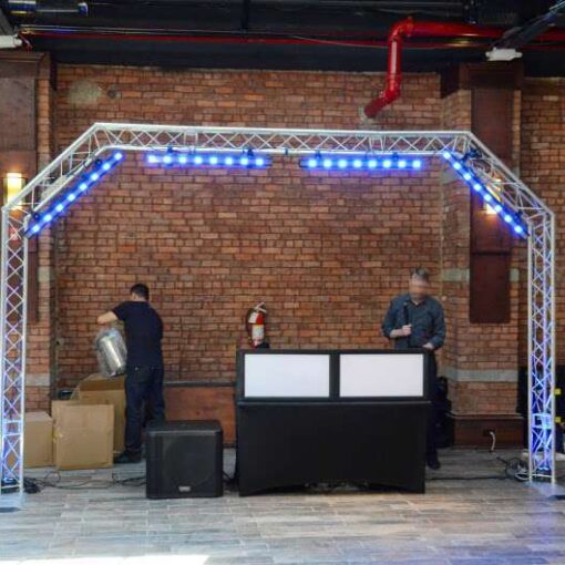 An Arch DJ Truss with Multiple LED lights and lighting controller for a wedding at 26 Bridge. 