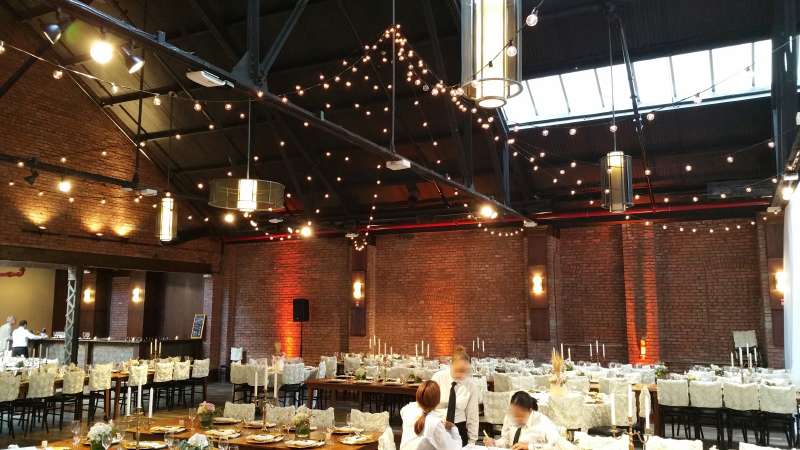 Sandra Marcelin and Mcduff Goldman wedding on Saturday, October 17, 2015 at 26 Bridge. String Lights in a circular pattern over the dance floor at 26 Bridge. 10 amber Up-Lights around the perimeter wall of the main space.