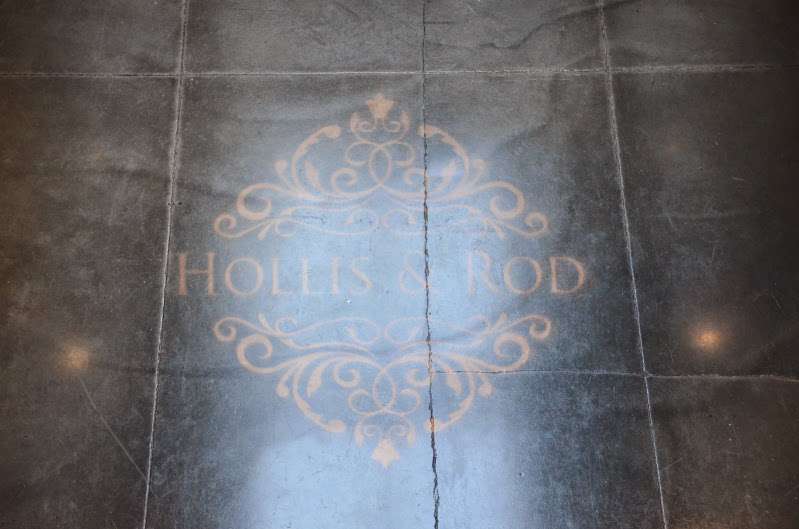 A custom gobo is projected on the main room's floor for a wedding at The Foundry.