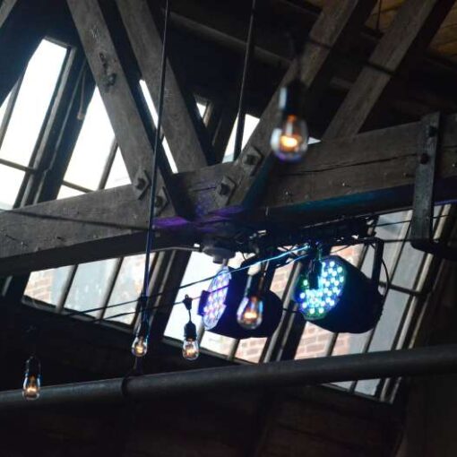 String Lights, along with a sound-activated / color-changing LED wash, are hanging in the main room above the dance floor at The Greenpoint Loft.