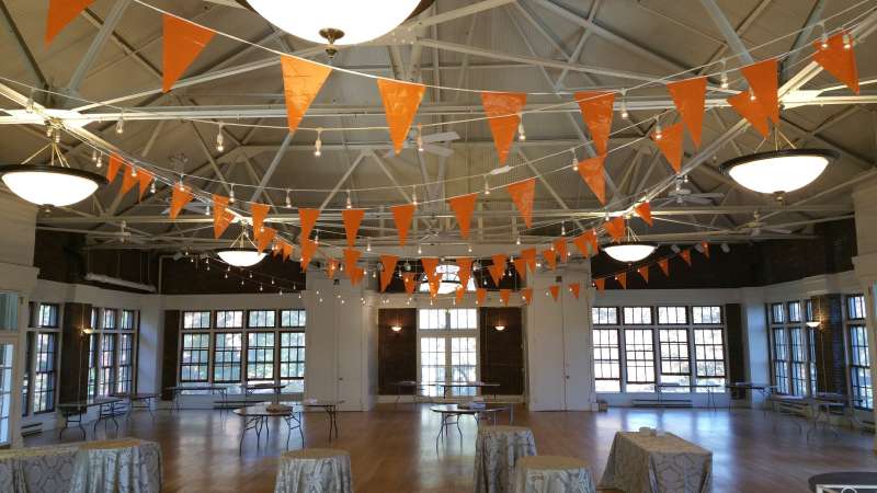 250ft of string lights with 250ft of Pennant Flags (Bunting Flags) hanging at The Prospect Park Picnic House.