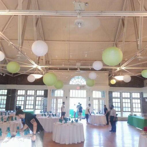 Lime and White Paper Lanterns and String Lights hanging inside The Prospect Park Picnic House