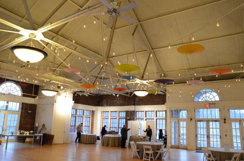 250ft of String Lights and 15 Paper Parasols / Paper Umbrellas hanging inside The Prospect Park Picnic House.