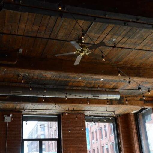 Cafe Lights/ Bistro Lights (String Lights) hanging for a wedding reception at The Dumbo Loft in Brooklyn, NY.
