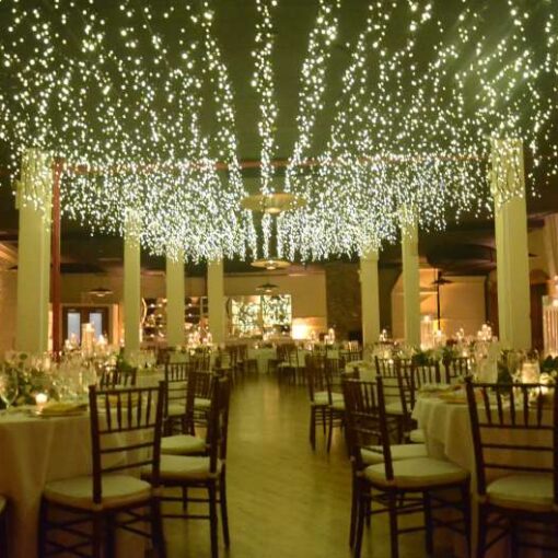 Icicle (Fairy) Lights are hanging the length of the 2nd-floor reception room between the center columns at The Liberty Warehouse.