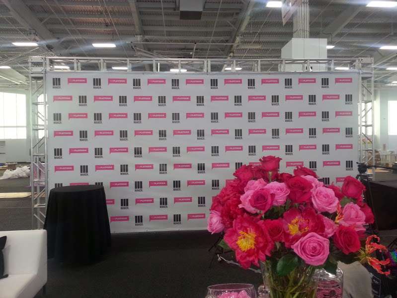 Setup a 20ft wide x 10ft height truss structure to support a Step-and-Repeat banner for a booth at BeautyCon NYC.