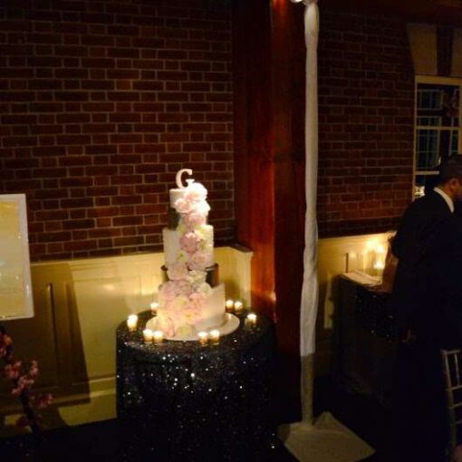 Pin-Spots are highlighting the floral arrangements at each table at The Central Park Loeb Boathouse.