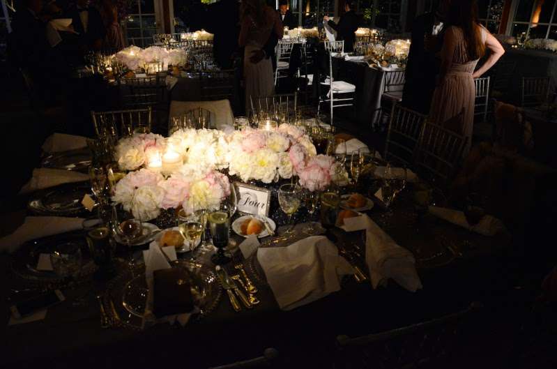 Pin-Spots are highlighting the floral arrangements at each table at The Central Park Loeb Boathouse.