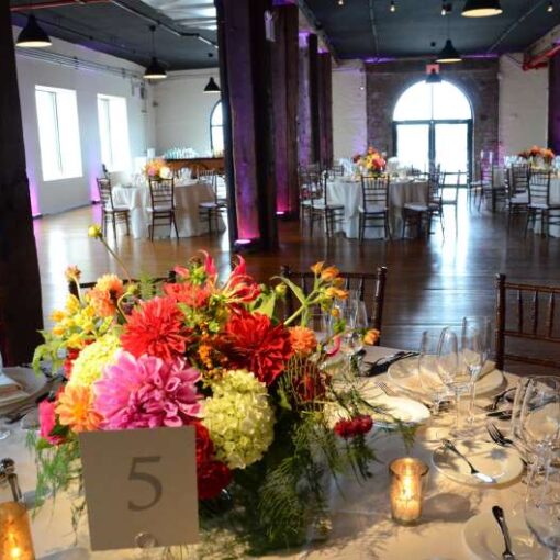 Pin Spots for wedding reception in Harbor Room at Liberty Warehouse in Red Hook (Brooklyn, NY). Also, Wireless Battery Powered LED Up-Lights.