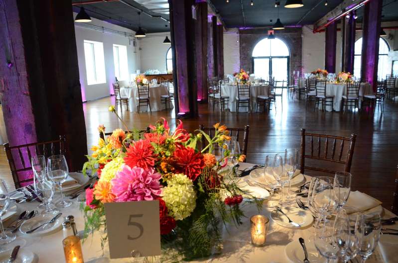 Pin Spots for wedding reception in Harbor Room at Liberty Warehouse in Red Hook (Brooklyn, NY). Also, Wireless Battery Powered LED Up-Lights.