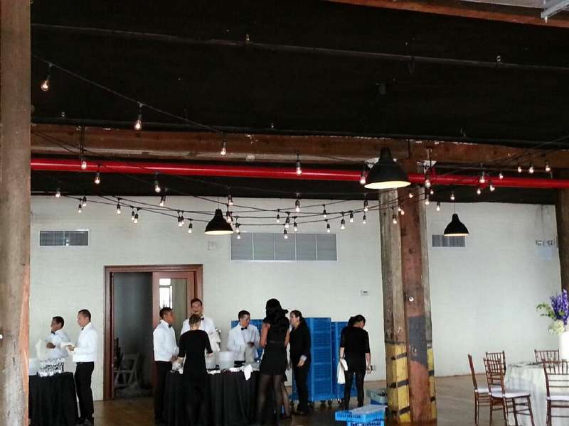 String Lights hanging in Zigzagging pattern over the dance floor in The Harbor Room at the Liberty Warehouse.