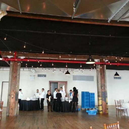 String Lights hanging in Zigzagging pattern over the dance floor in The Harbor Room at the Liberty Warehouse.