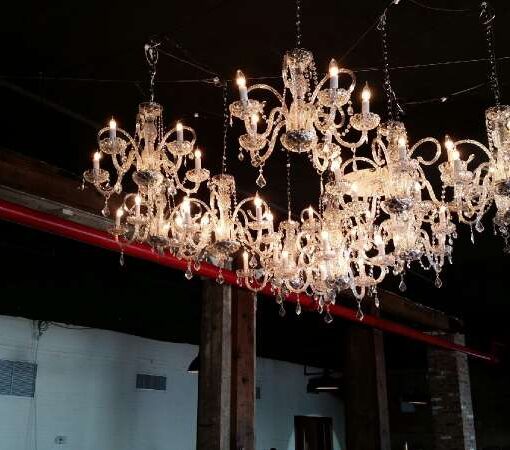 Chandeliers hanging over the dance floor at the Liberty Warehouse.