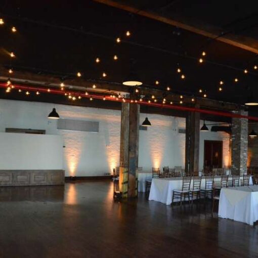 String Lights hanging inside the Main Room above the dance floor at The Liberty Warehouse.