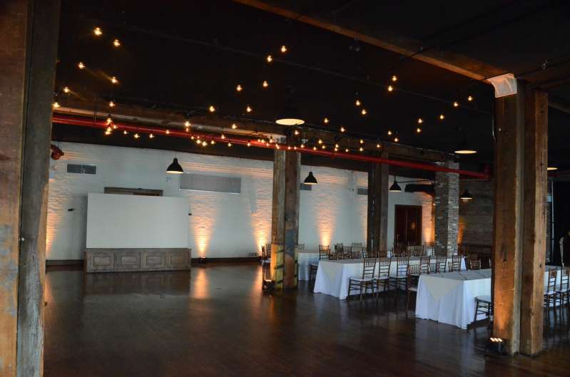 String Lights hanging inside the Main Room above the dance floor at The Liberty Warehouse.