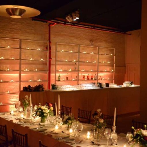 Table Pin-spots for the centerpiece on both bars at each end of the room. In addition, Up-Lights along the perimeter walls.
