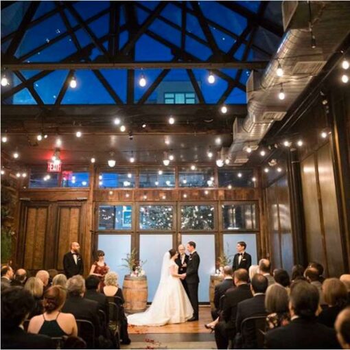String Lights hanging in The Atrium for a wedding reception at The Brooklyn Winery.