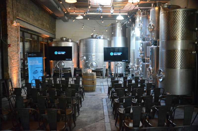 A pair of 60" Flat Screen TVs showing the same image for a corporate event at The Brooklyn Winery. Also a wireless microphones, Up-lights and String Lights for a corporate event hosted at The Brooklyn Winery.