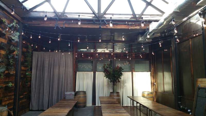 150ft of String Lights in a zigzagging pattern hanging overhead for a wedding in The Atrium at The Brooklyn Winery.