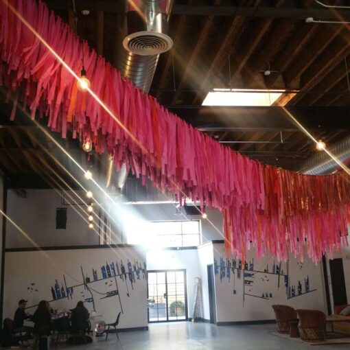 Hanging a section of Patina's Color Condition across the ceiling at for a festive Holiday Party hosted at Dobbin St.