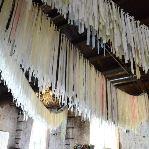 Patina Rental’s Color Condition with our String Lights embedded inside for a wedding reception at The Green Building.