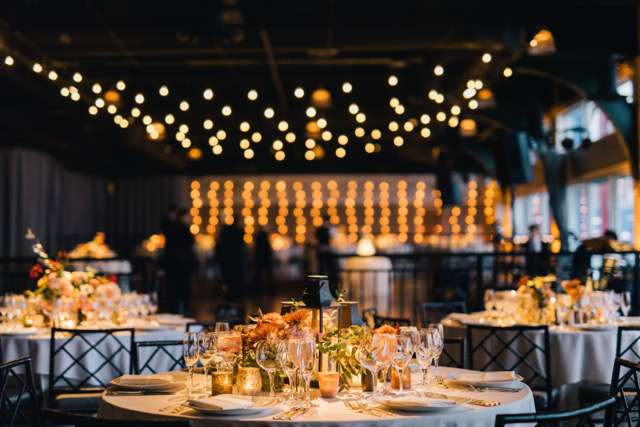 String Lights hanging over the dance floor in a zigzag pattern for a wedding at The Lighthouse at Chelsea Piers.