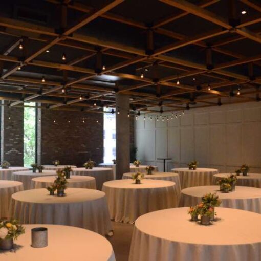 String Lights hanging in a zigzag pattern inside the Great Room at The Second Floor in The Eventi Hotel.