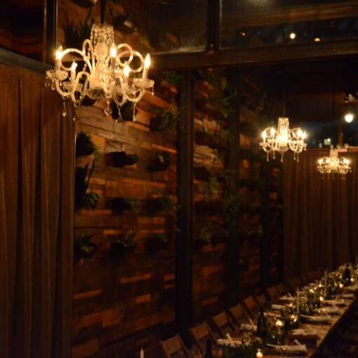 Four Chandeliers hanging in the Harvest Room and The Atrium for a wedding at The Brooklyn Winery.