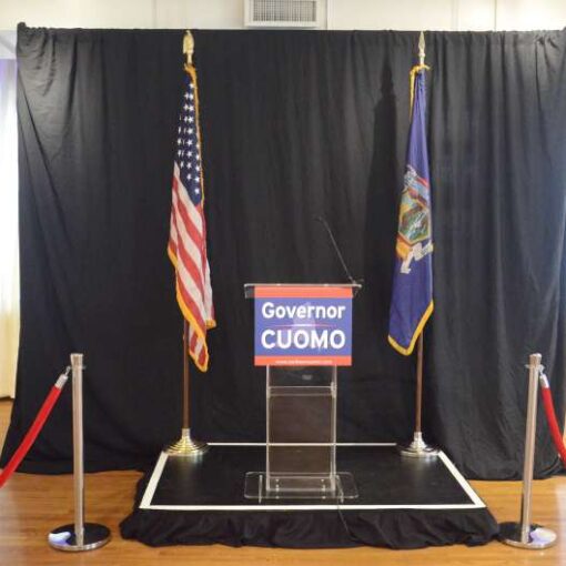 Universal Light and Sound setup our Acrylic Podium, Stage, Pipe-and-Drape, along with speakers and microphone for The New York State Craft Beverage Tasting hosted at The Midtown Loft and Terrace featuring Gov. Andrew Cuomo.