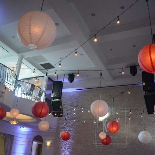 String Lights with Paper Lanterns hanging for a wedding reception at The Renaissance Event Hall in Long Island City, NY.