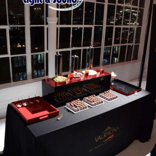 Universal Light and Sound provided and set up spotlights for each display table at Valrhona Chocolate's New York Showcase for their new line of bonbons.
