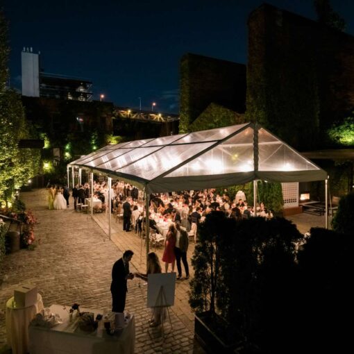 A clear top tent in the courtyard at The Found for Kim & Mert’s wedding - June 1st, 2025
