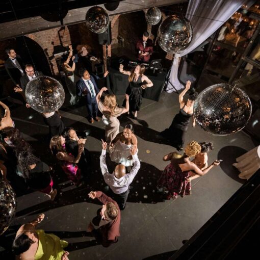 Multiple Mirror Ball hanging in the main reception room at The Found for Kim & Mert’s wedding - June 1st, 2025