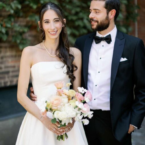 Gianna + Steven in the courtyard for their summer wedding at The Foundry