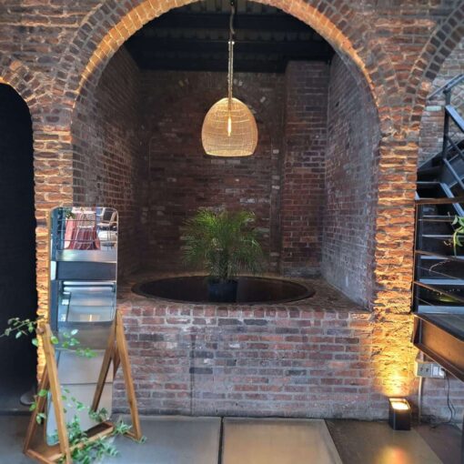 A Hanging rattan lantern in the first alcove at The Foundry.