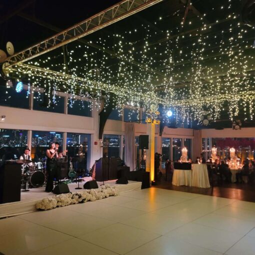 An installation of Fairy Lights and Up-Lights for Taylor and Troy's elegant wedding at The Lighthouse at Chelsea Piers. An installation of Fairy Lights and Up-Lights for Taylor and Troy's elegant wedding at The Lighthouse at Chelsea Piers.