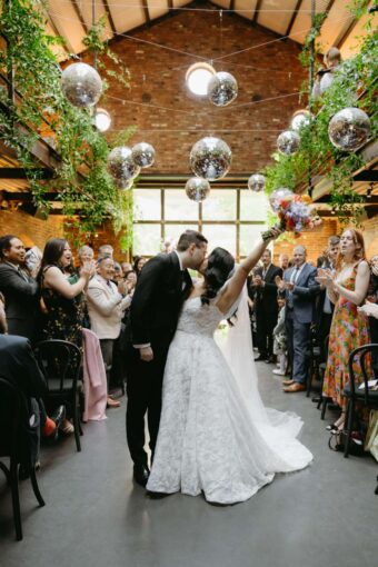 Kelly and Benjamin included a fun display of Disco Ball in the main reception for their Wedding on October 3, 2025 at The Foundry.