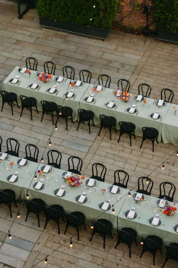 String lights are highly recommended for an outdoor NYC wedding to provide essential, warm, and romantic ambiance after dark.