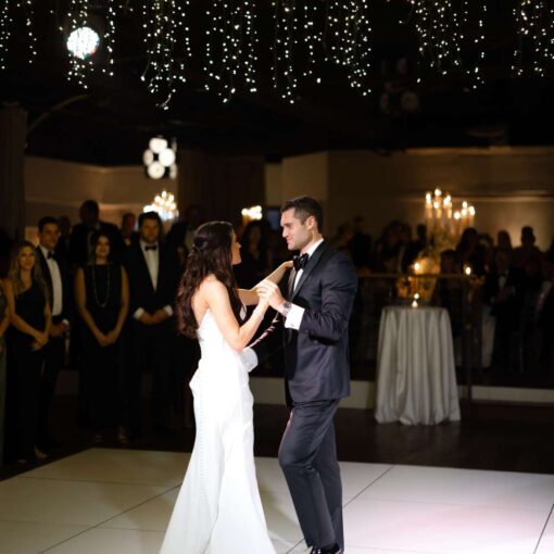 An installation of Fairy Lights above the dance floor for Taylor and Troy's elegant wedding at The Lighthouse at Chelsea Piers. An installation of Fairy Lights above the dance floor for Taylor and Troy's elegant wedding at The Lighthouse at Chelsea Piers.