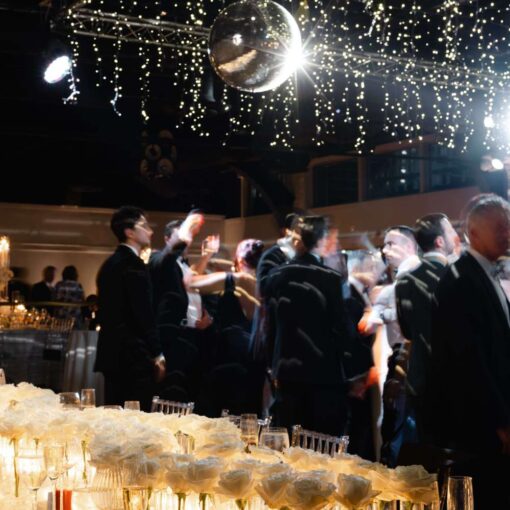 An installation of Fairy Lights and a mirror ball for Taylor and Troy's elegant wedding at The Lighthouse at Chelsea Piers. An installation of Fairy Lights and a mirror ball for Taylor and Troy's elegant wedding at The Lighthouse at Chelsea Piers.