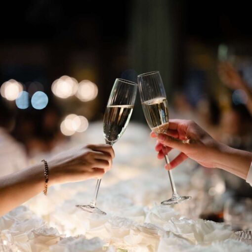 Champagne glasses at Taylor and Troy's elegant wedding at The Lighthouse at Chelsea Piers. Champagne glasses at Taylor and Troy's elegant wedding at The Lighthouse at Chelsea Piers.
