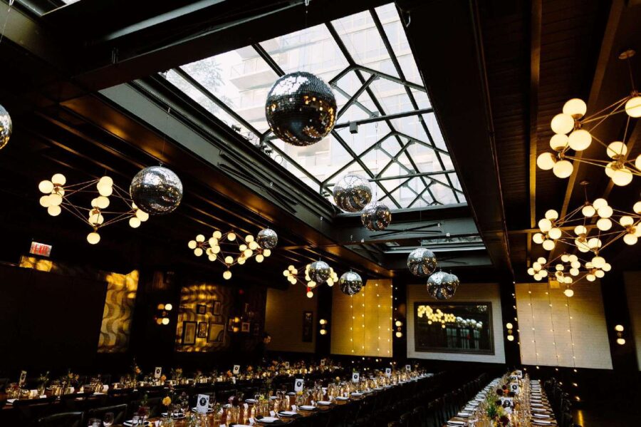 Hanging multiple Mirror Balls in a cluster is a popular addition to the decor for couples getting married at 501 Union.