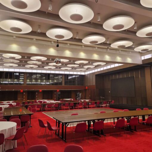 A rotating Mirror Ball hang from the ceiling for a wedding in The Constellation Ballroom at The TWA Hotel.