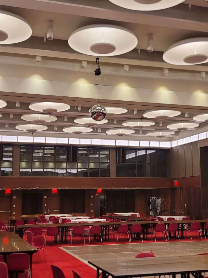 A rotating Mirror Ball hang from the ceiling for a wedding in The Constellation Ballroom at The TWA Hotel.