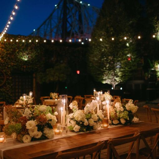 Dining outdoors in The Courtyard under String Lights at Kasey and Andrew's wedding at The Foundry - September 13, 2024