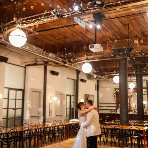 A rotting Mirror Ball above the dance floor at Christie and Drew's wedding at The Wythe Hotel.