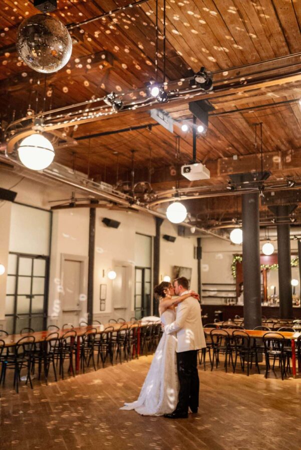 A rotting Mirror Ball above the dance floor at Christie and Drew's wedding at The Wythe Hotel.