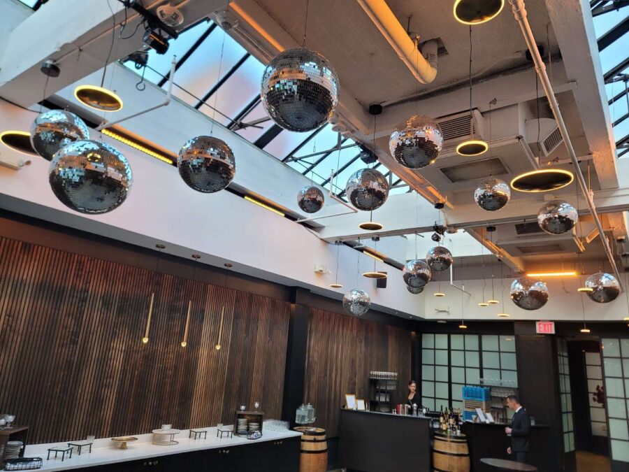 Mirror Balls above the dance floor in the Gallery for a wedding at The Brooklyn Winery, October 31, 2025